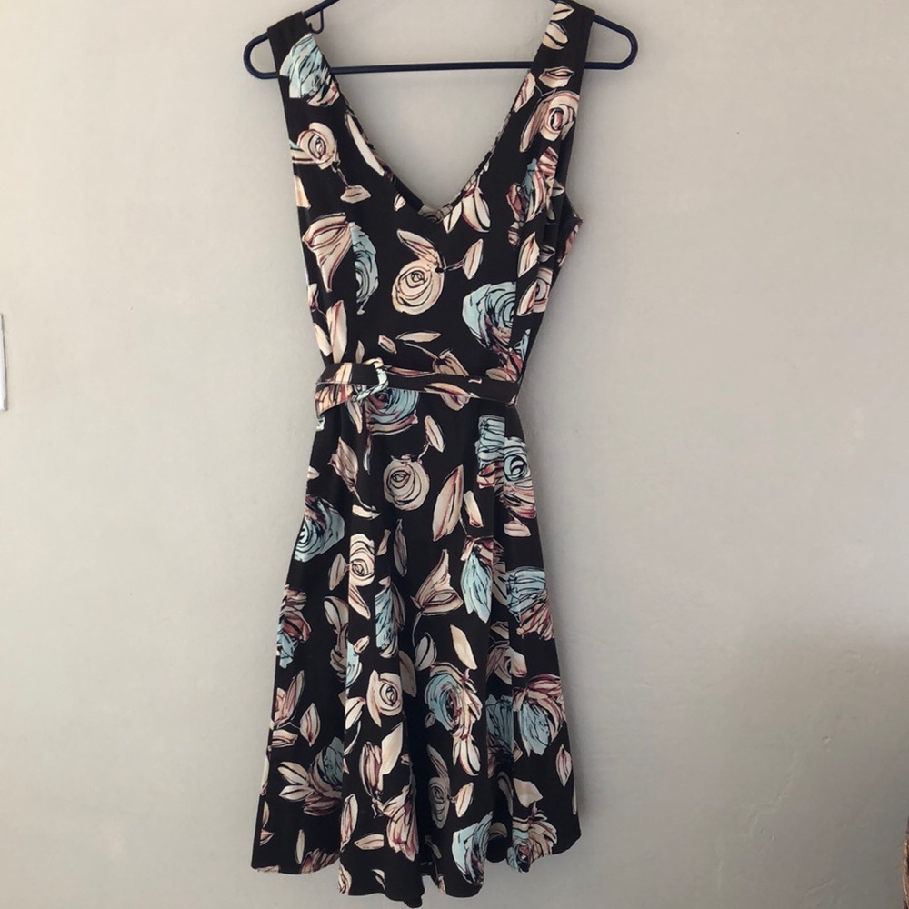 Brown flowered dress.